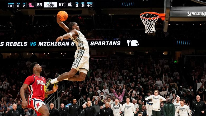 Mar 28, 2025; Atlanta, GA, USA; Michigan State Spartans forward Coen Carr (55) dunks against Mississippi Rebels forward Malik Dia (0) in the second half of a South Regional semifinal of the 2025 NCAA tournament at State Farm Arena. Mandatory Credit: Dale Zanine-Imagn Images     TPX IMAGES OF THE DAY     

Will