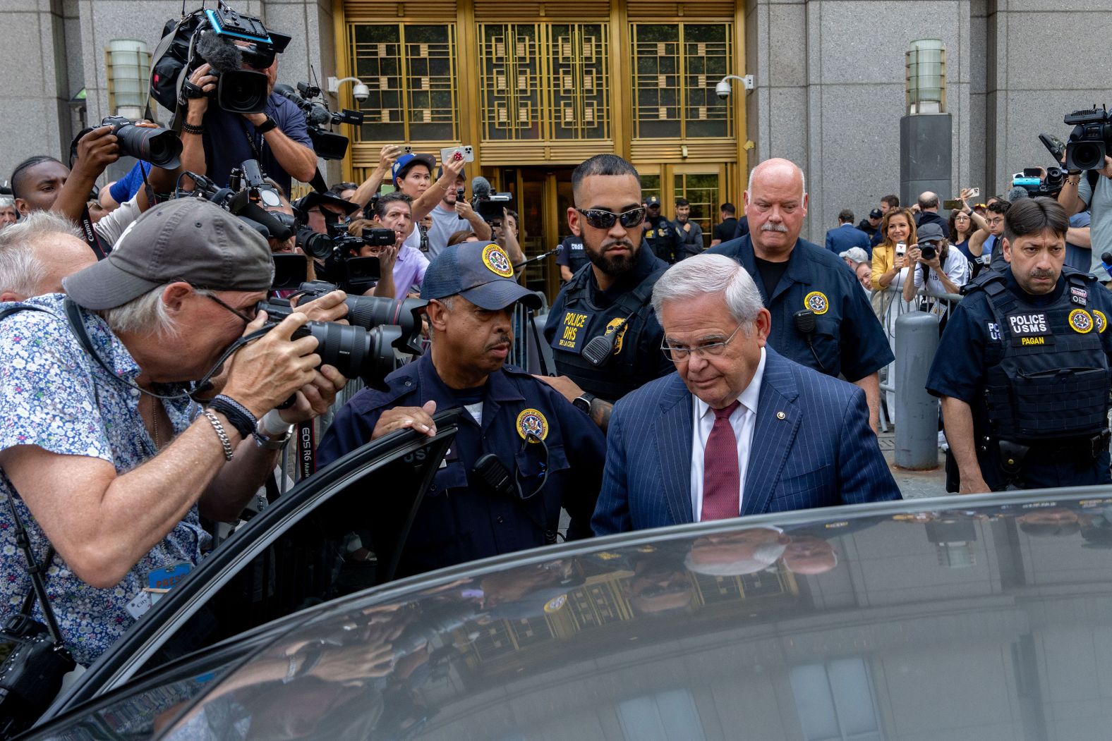 US Sen. Bob Menendez leaves a federal court in New York on Tuesday, July 16. <a href="index.php?page=&url=https%3A%2F%2Fwww.cnn.com%2F2024%2F07%2F16%2Fpolitics%2Fbob-menendez-verdict%2Findex.html">A jury on Tuesday found Menendez guilty on all counts</a> in his federal corruption trial, and Senate Majority Leader Chuck Schumer swiftly called on his Democratic colleague to resign.