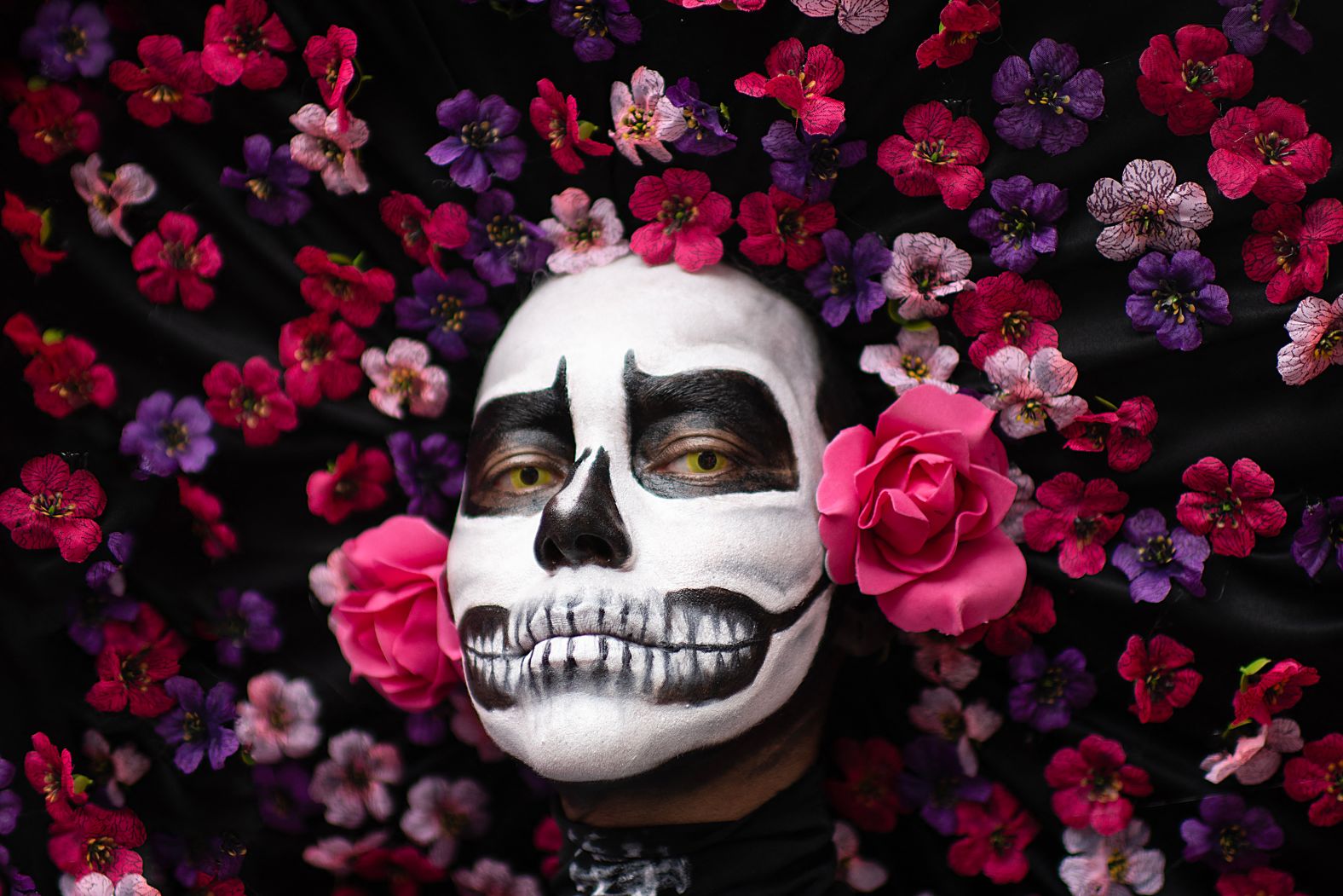 A woman poses for a picture during the KatrinasFest in San Jose, Costa Rica, on Sunday, November 3. The Catrina character, a tall female skeleton commonly depicted wearing a fancy gown and a lavish hat, is a popular <a href="index.php?page=&url=https%3A%2F%2Fwww.cnn.com%2Ftravel%2Fday-of-the-dead-traditions-explained-cec%2Findex.html">Day of the Dead</a> symbol.