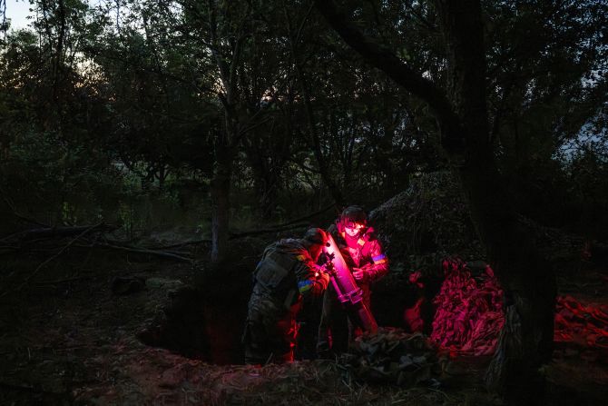 Artillerymen from Ukraine fire a mortar toward Russian troops near the village of Lyptsi in Ukraine’s Kharkiv region on Wednesday, June 19.