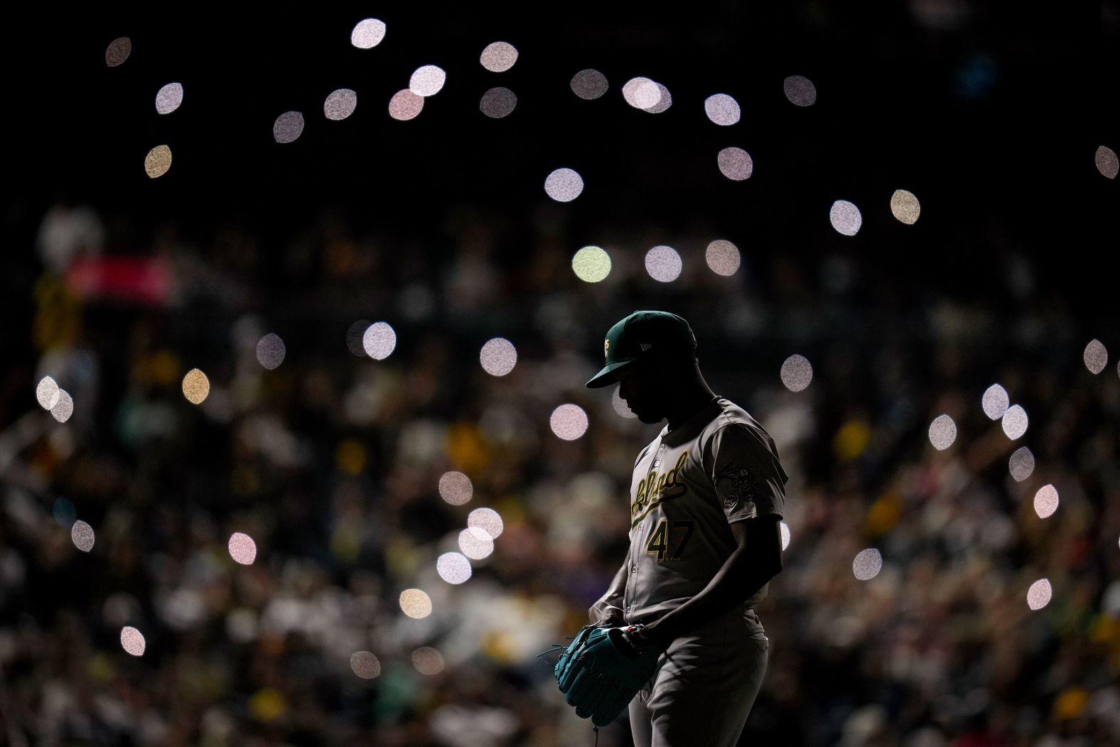 Oakland Athletics relief pitcher Michel Otañez waits to pitch during a stadium light malfunction in San Diego on Monday, June 10.