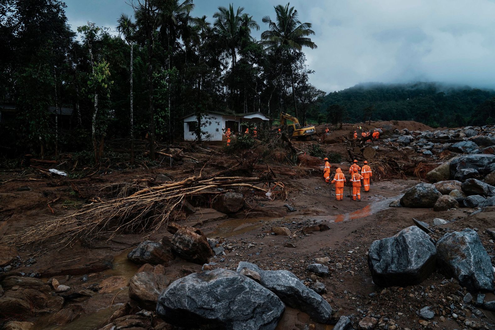 Rescuers search through mud and debris in India’s Wayanad district on Thursday, August 1. Torrential rains caused <a href="index.php?page=&url=https%3A%2F%2Fwww.cnn.com%2F2024%2F07%2F30%2Fasia%2Findia-wayanad-landslide-deaths-rescue-intl-hnk%2Findex.html">deadly landslides</a> in the country’s southern Kerala state.