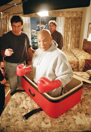 Foreman is directed on the set of a commercial in 1994.