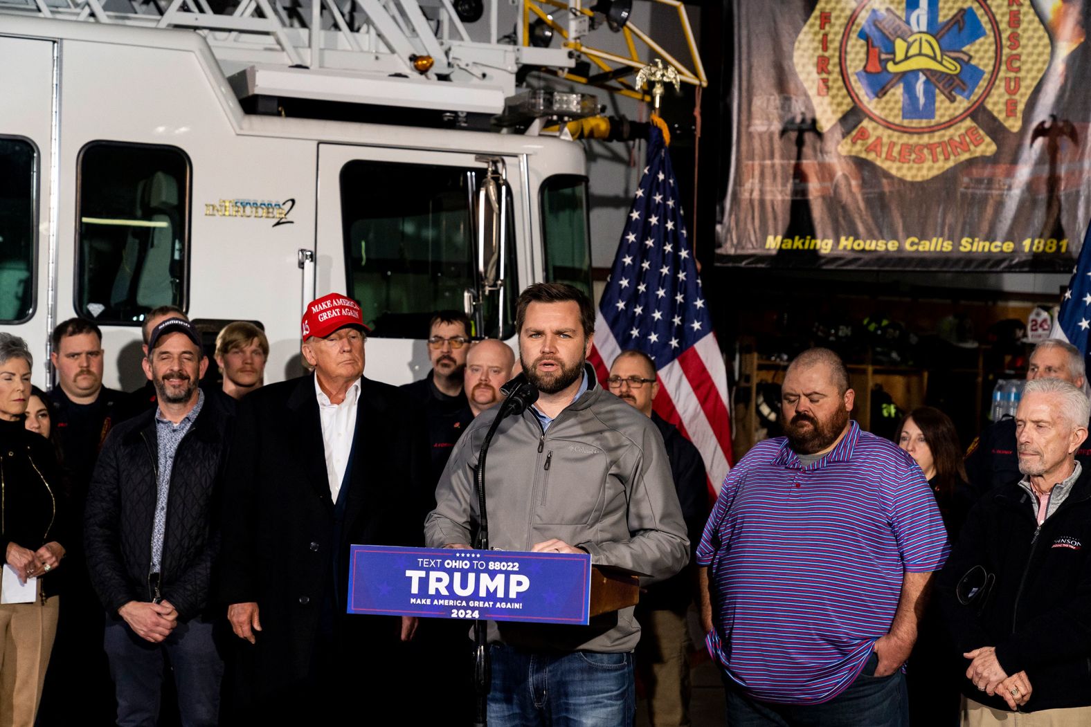 Vance, with Trump behind him, speaks to the media at the East Palestine Fire Department station in East Palestine, Ohio, in February 2023. A train carrying hazardous materials, including the toxic chemical vinyl chloride, had derailed in East Palestine, and <a href="index.php?page=&url=https%3A%2F%2Fwww.cnn.com%2F2023%2F02%2F08%2Fus%2Feast-palestine-ohio-train-derailment-fire-wednesday%2Findex.html">the wreckage burned for days</a>.