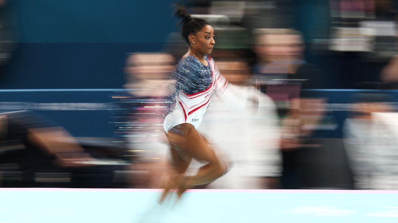 TOPSHOT - US' Simone Biles competes in the vault event of the artistic gymnastics women's team final during the Paris 2024 Olympic Games at the Bercy Arena in Paris, on July 30, 2024. (Photo by Anne-Christine POUJOULAT / AFP) (Photo by ANNE-CHRISTINE POUJOULAT/AFP via Getty Images)