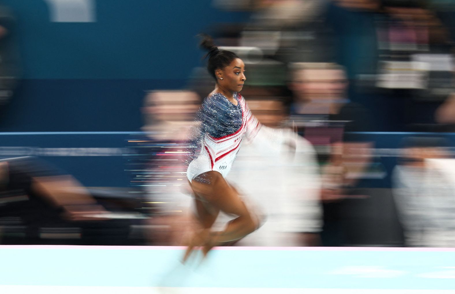 Biles sprints during her vault attempt.