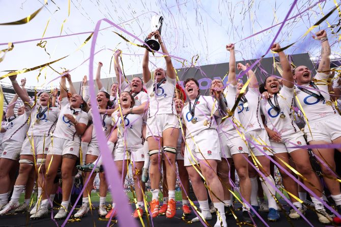 Zoe Aldcroft lifts the trophy after England won the Women’s Six Nations rugby competition on Saturday, April 26.