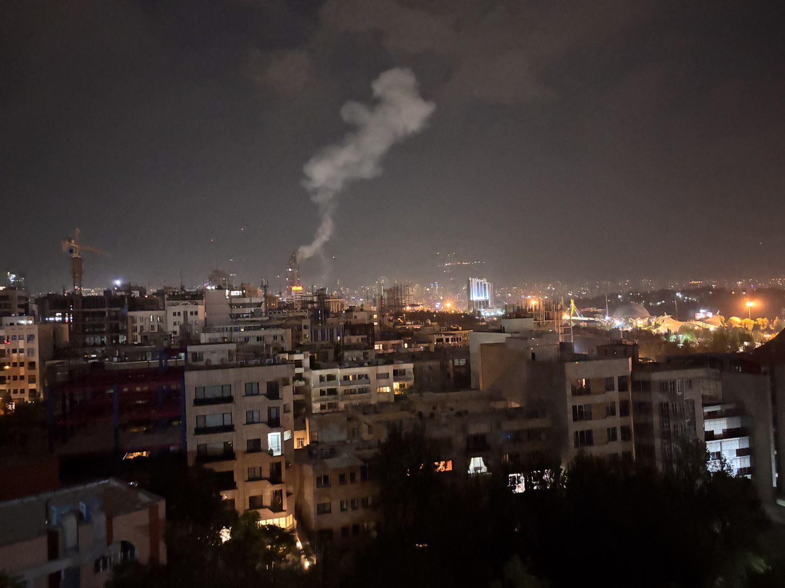 Smoke rises after Israel's wave of airstrikes on Tehran.