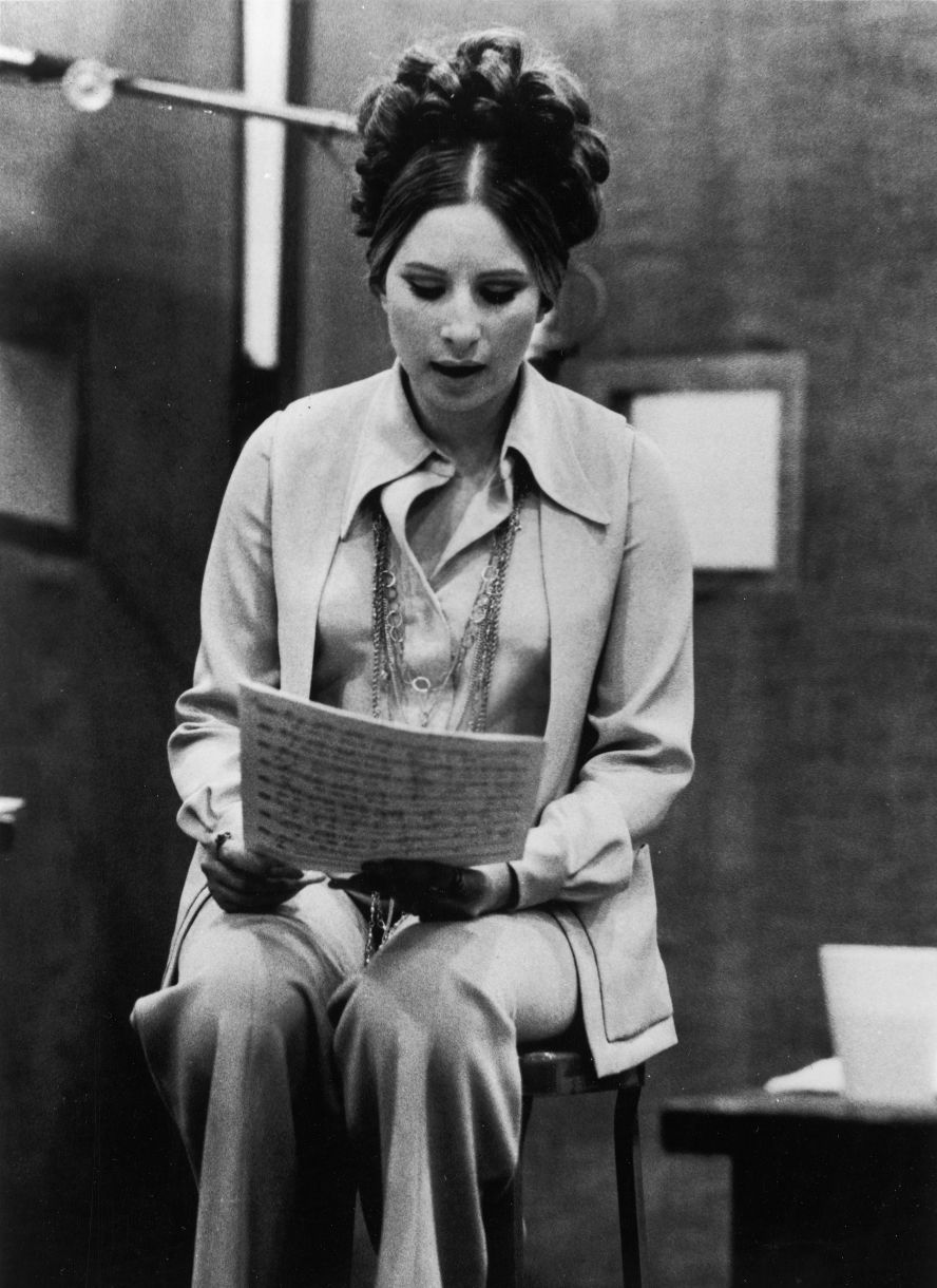 Streisand rehearses during a recording session in 1975.
