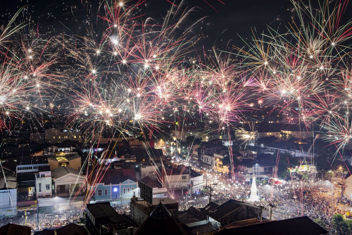 Fireworks illuminate the city's skyline during New Year's celebrations in Yogyakarta, Indonesia.