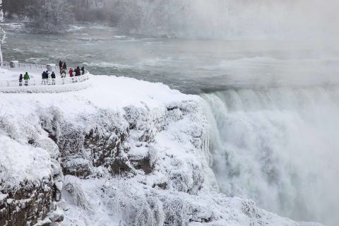 Visitors view Niagara Falls in New York on Sunday, December 31.