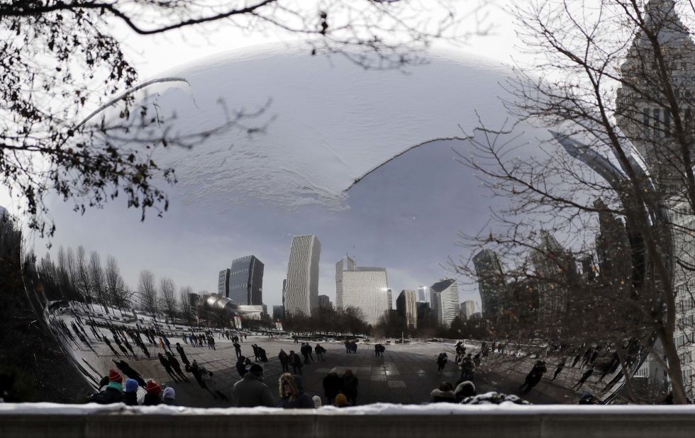 The Cloud Gate sculpture is blanketed with snow in Chicago's Millennium Park on December 31.
