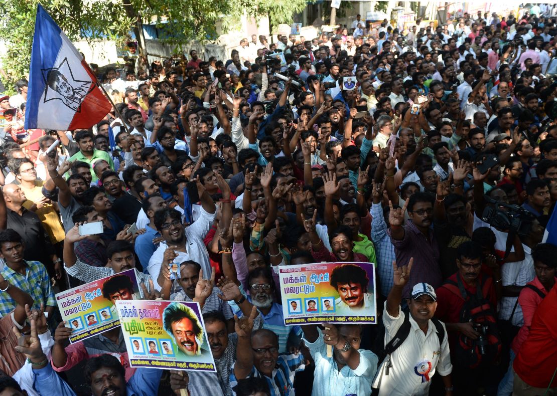 Indian fans of Rajinikanth celebrate after his announcement that he will enter into politics, in Chennai on December 31, 2017.
