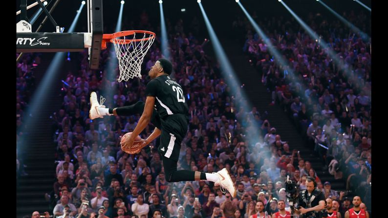 D.J. Stephens goes between his legs on his way to winning the slam dunk contest of France's basketball league on Friday, December 29.
