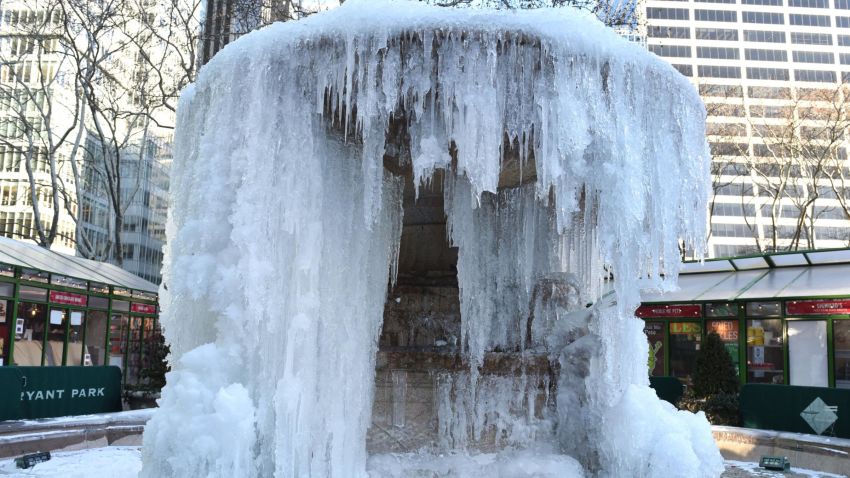 The frozen Josephine Shaw Lowell Memorial Fountain located at Bryant Park in New York is viewed on January 2, 2018 as New Yorkers return back to work after the holiday break.  / AFP PHOTO / TIMOTHY A. CLARY        (Photo credit should read TIMOTHY A. CLARY/AFP/Getty Images)