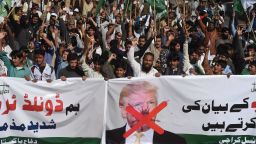 Activists of the Difa-e-Pakistan Council shout anti-US slogans at a protest in Karachi on January 2, 2018. Pakistan has summoned the US ambassador, an embassy spokesman said January 2, in a rare public rebuke after Donald Trump lashed out at Islamabad with threats to cut aid over "lies" about militancy. / AFP PHOTO / ASIF HASSAN        (Photo credit should read ASIF HASSAN/AFP/Getty Images)