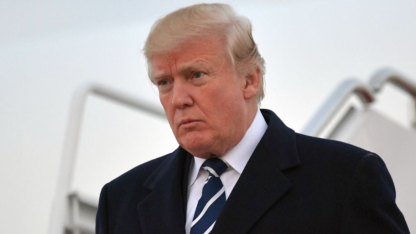 US President Donald Trump steps off Air Force One upon arrival at Andrews Air Force Base in Maryland on December 2, 2017. 
Trump is returning to Washington, DC after attending fundraisers in New York, New York. / AFP PHOTO / MANDEL NGAN        (Photo credit should read MANDEL NGAN/AFP/Getty Images)