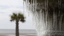 Icicles hang from the fountain at Beau View condominiums in Biloxi, Miss., on Monday, Jan. 1, 2018. A hard freeze hit South Mississippi overnight and temperatures are expected to remain near or below freezing for the rest of the week.(John Fitzhugh/The Sun Herald via AP)/The Sun Herald via AP)