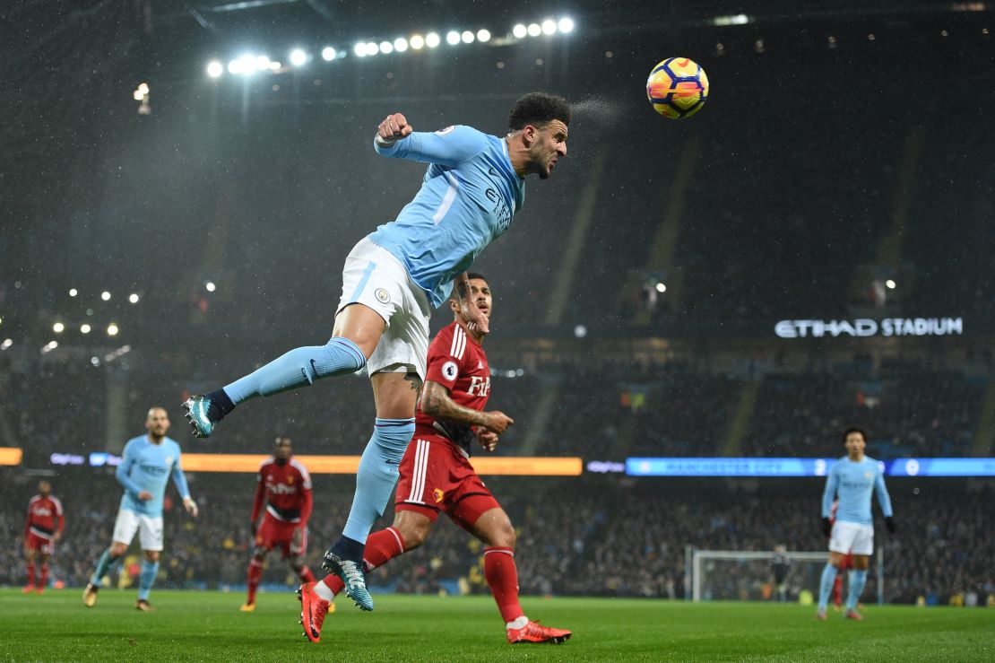 Kyle Walker heads the ball clear in the game against Watford.