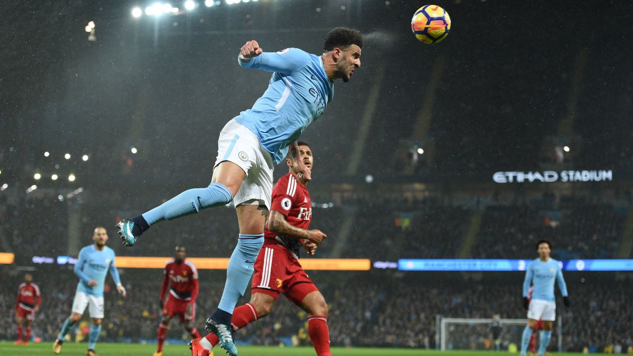 Kyle Walker heads the ball clear in the game against Watford.