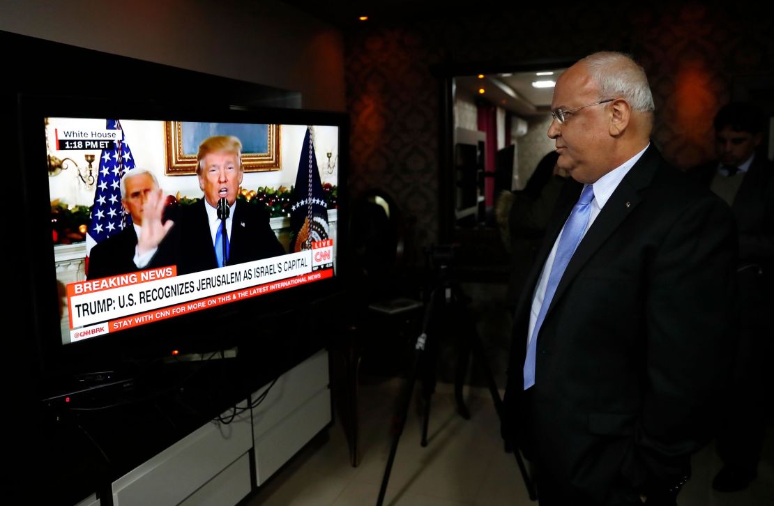 Chief Palestinian negotiator Saeb Erekat watches a speech given by US President Donald Trump on December 6 during which Trump recognized Jerusalem as Israel's capital.