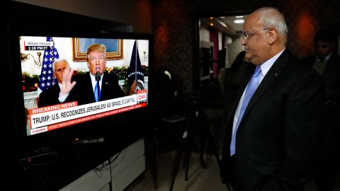 Chief Palestinian negotiator Saeb Erekat watches a speech given by US President Donald Trump on December 6 during which Trump recognized Jerusalem as Israel's capital.