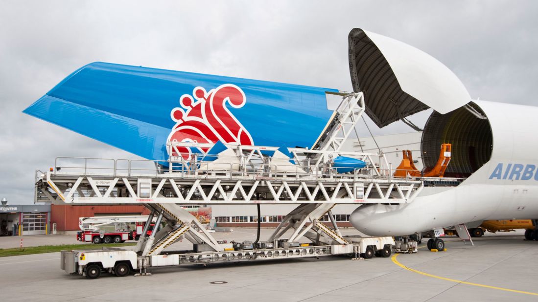 <strong>Voyage of the tail fin: </strong>While the six major components of an A380 are enjoying a sea cruise, the plane's vertical tail fin flies from Hamburg to Toulouse inside one of Airbus' A300-600ST Super Transporters. 