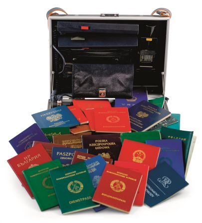 A suitcase used for passport control and border security in the 1980s. It contained a variety of stamps and special inks for border officers to use while checking travel documents and updating visas.