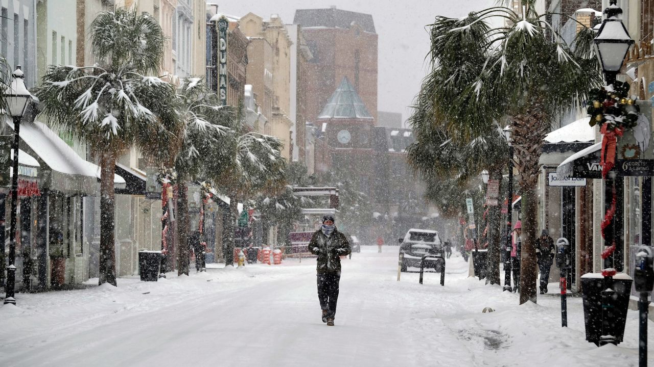 A rare snowfall leaves a street virtually deserted in downtown Charleston, South Carolina, on Wednesday, January 3. 
