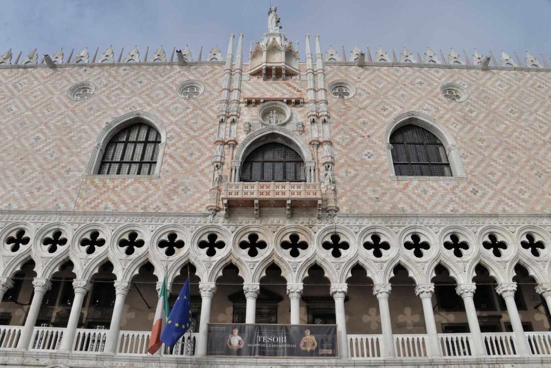 A poster indicating the precious display hangs from Venice's Doge's Palace.