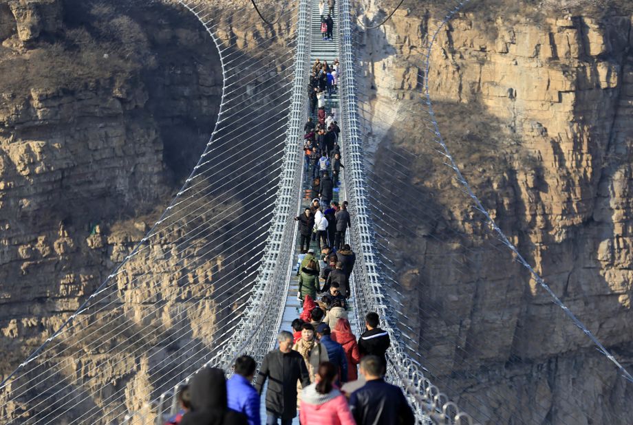 <strong>Test of nerves:</strong> Billed as the world's longest glass-bottomed suspension bridge, this new structure in China's northeastern Hebei province opened at the end of December 2017.