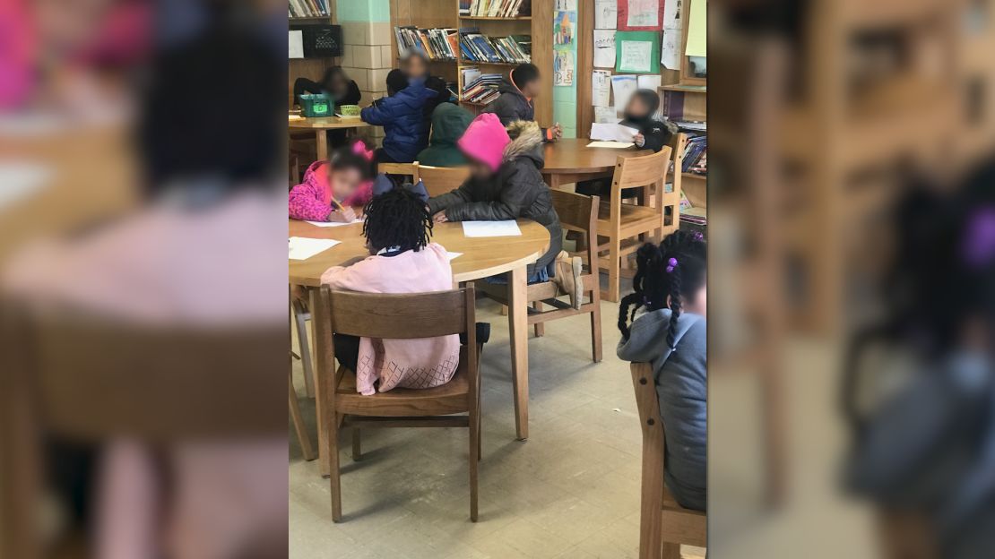 Baltimore elementary school teacher Aaron Maybin says this photo shows children -- some wearing coats -- in his cold classroom at Matthew A. Henson Elementary School on Wednesday.