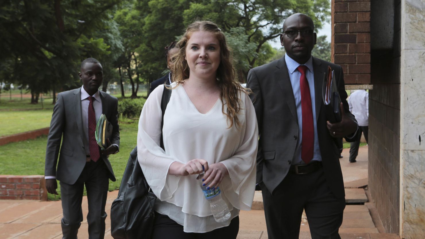 Martha O'Donovan appears Thursday at Harare Magistrates' Court accompanied by her lawyers.