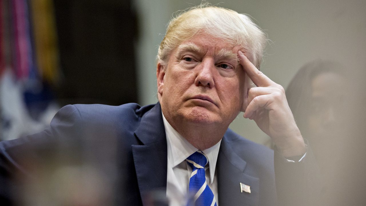 WASHINGTON, DC - MARCH 27:  U.S. President Donald Trump listens while meeting with women small business owners in the Roosevelt Room of the White House on March 27, 2017 in Washington, D.C.  Investors on Monday further unwound trades initiated in November resting on the idea that the election of Trump and a Republican Congress meant smooth passage of an agenda that featured business-friendly tax cuts and regulatory changes. (Photo by  Andrew Harrer-Pool/Getty Images)