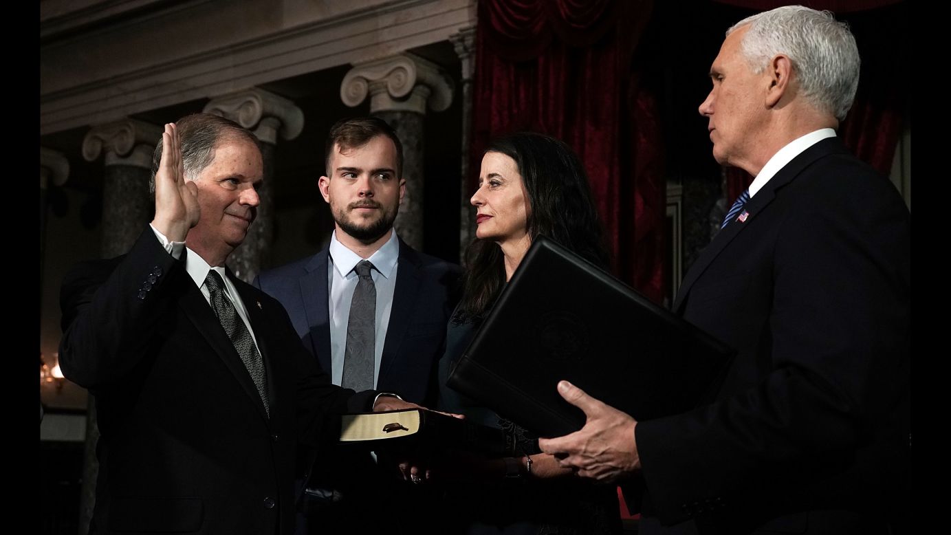 US Sen. Doug Jones is joined by his wife, Louise, and his son Carson as Vice President Mike Pence conducts a mock swearing-in ceremony on Wednesday, January 3. Jones is the first Democrat that Alabama has elected to the Senate since 1992. <a href="http://www.cnn.com/2017/12/13/politics/doug-jones/index.html" target="_blank">He defeated Republican Roy Moore last month</a> in a special election.