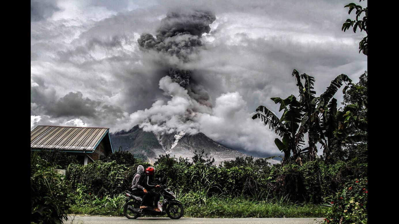 Mount Sinabung spews thick smoke in Karo, Indonesia, on Tuesday, January 2. The volcano has been highly active since roaring back to life in 2010.