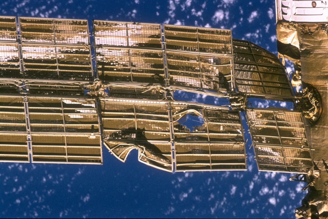 A close-up view of the solar array panel on Russia's Mir space station shows damage incurred by the impact in 1997 of a Russian unmanned resupply ship.