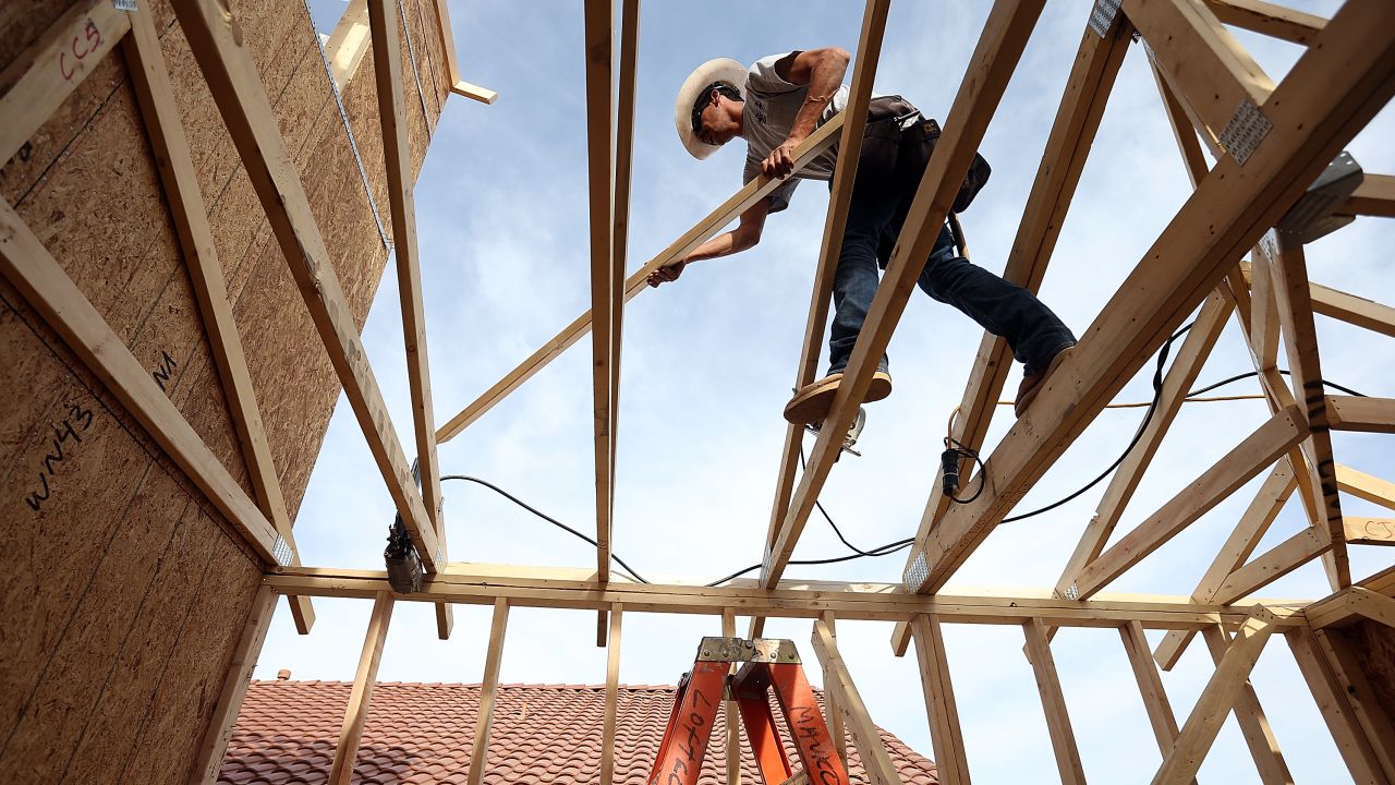 PHOENIX, AZ - MARCH 05:  A worker builds a new home at the Pulte Homes Fireside at Norterra-Skyline housing development on March 5, 2013 in Phoenix, Arizona. In 2008, Phoenix, Arizona was at the forefront of the U.S. housing crisis with home prices falling 55 percent between 2005 and 2011 leaving many developers to abandon development projects. Phoenix is now undergoing a housing boom as sale prices have surged 22.9 percent, the highest price increase in the nation, and homebuilders are scrambling to buy up land.  (Photo by Justin Sullivan/Getty Images)