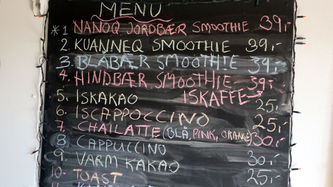 The drinks menu at the Blue Cafe in Qeqertarsuaq. There's nothing like a kuanneq or blabaer smoothie to prepare you for a day at the beach.