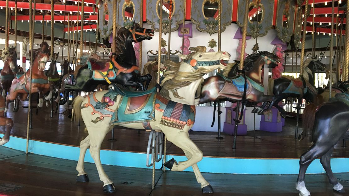 Forest Park Carousel has 52 animals, 49 of which are horses.