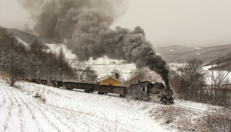 <strong>Low temperatures: </strong>Battling these extreme temperatures was part of the experience: "Once the temperature gets down around -40 C [-40 F] you have to take it very seriously or you will get frostbite," says Kitching. Pictured here: Empty coal wagons in 2005 on the Huanan Coal Railway.