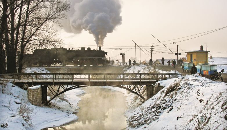 <strong>Modernizing trains:</strong> China's railway scene has modernized -- but Kitching remains intrigued. "The new high-speed lines are an amazing development in China -- with much of the routes being elevated on concrete viaducts," he says. Times have changed since this photograph of the railway at Yijing (First) Mine, in 2006.