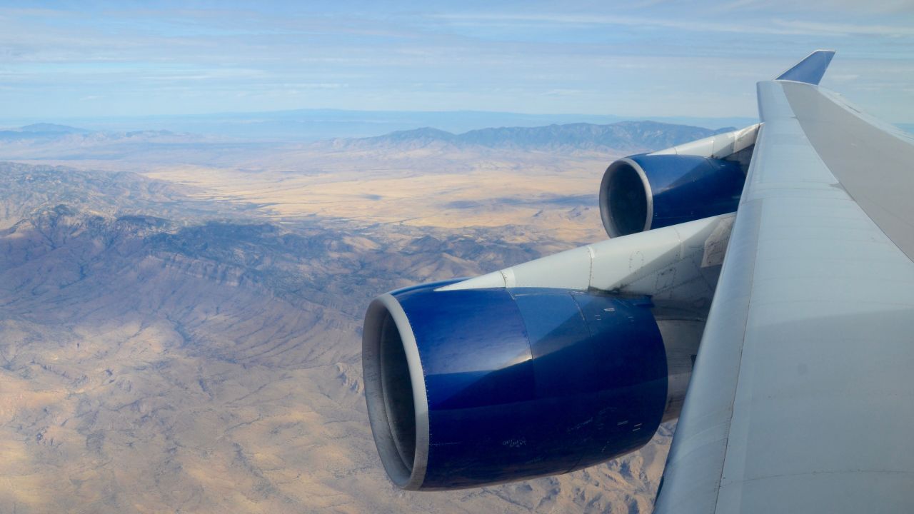 Two of the Boeing 747-400's engines powering the jet on its way to retirement in the Arizona desert.