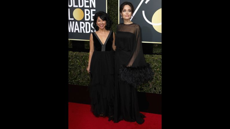 Loung Ung, left, and Angelina Jolie. Ung, a spokeswoman for the Campaign for a Landmine-Free World, was one of <a href="index.php?page=&url=http%3A%2F%2Fwww.cnn.com%2F2018%2F01%2F07%2Fentertainment%2Fgolden-globes-activists-actresses-red-carpet%2Findex.html" target="_blank">several activists</a> who appeared on the red carpet with actors.