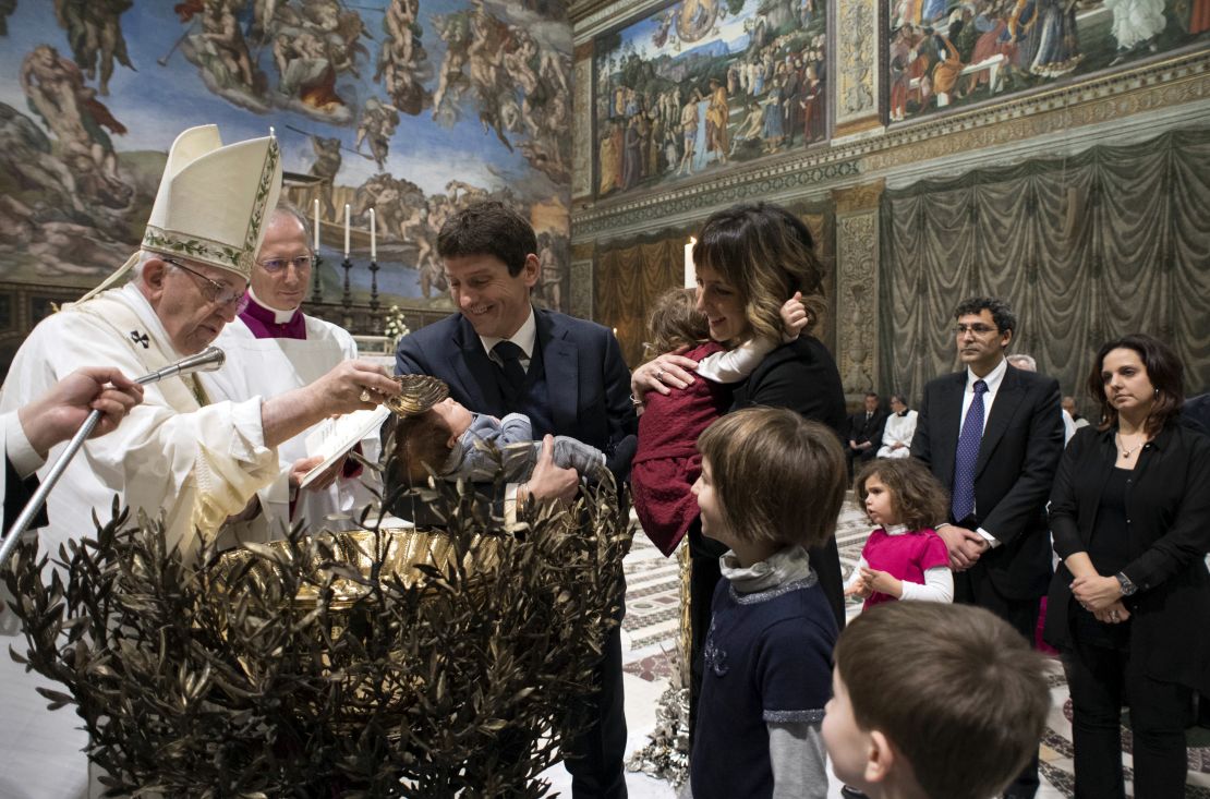 Francis baptized 34 babies during the annual ceremony. 