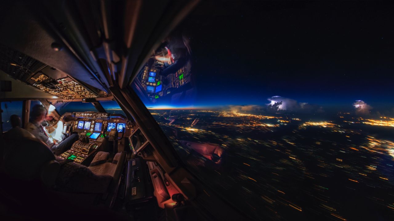 <strong>Sharing experiences</strong>: The pilot started out photographing his travels off-plane. But he soon realized his experiences in the air were also worth capturing. <em>Pictured here: Views of sunrise and thunderstorms from the cockpit.</em>