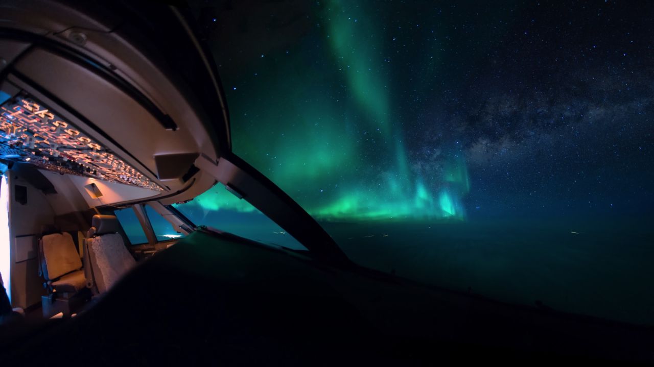 <strong>Airplane views:</strong> Dutch pilot Christiaan van Heijst takes striking photographs of his magnificent view from the plane cockpit. <em>Pictured here: The Aurora Borealis captured from the cockpit.</em>