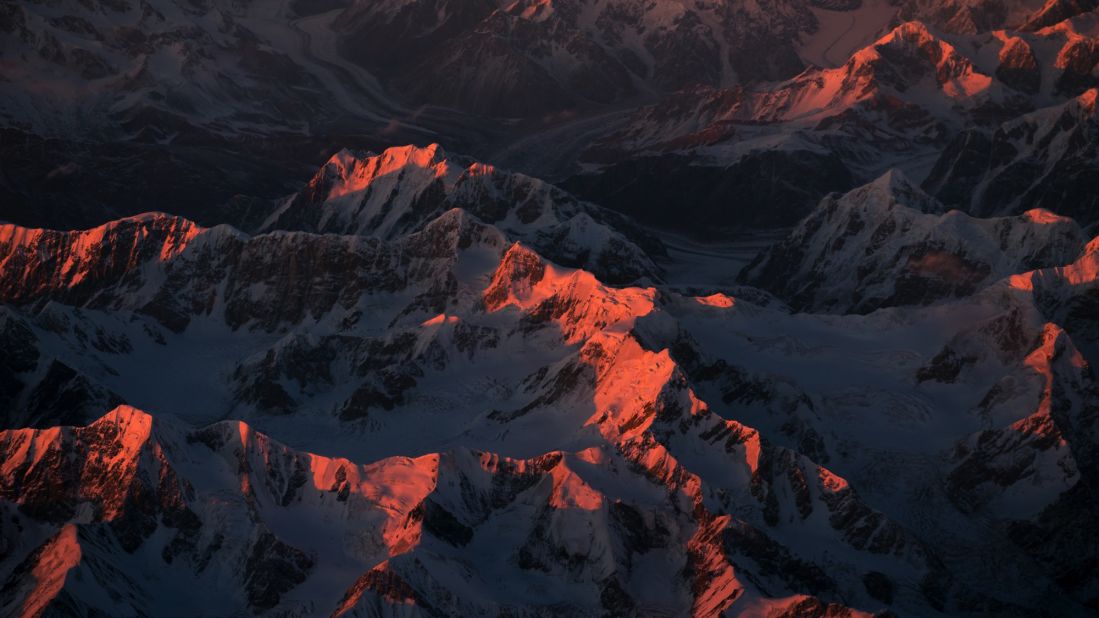 <strong>Rough landscapes: </strong>"Actually there are quite a few areas that I really enjoy - what they have in common is that it's all really isolated and rough landscapes," says van Heijst. He also names Alaska and Greenland as other favorites. <em>Pictured here: Sunset over the Himalayas.</em>