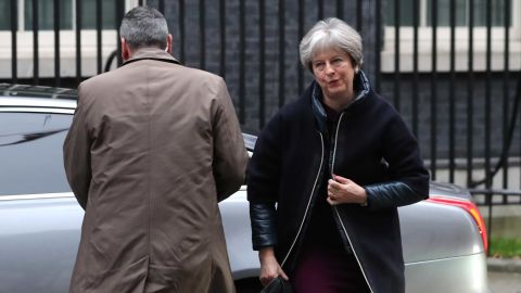 British Prime Minister Theresa May arrives at 10 Downing street in London on January 8, 2018.
