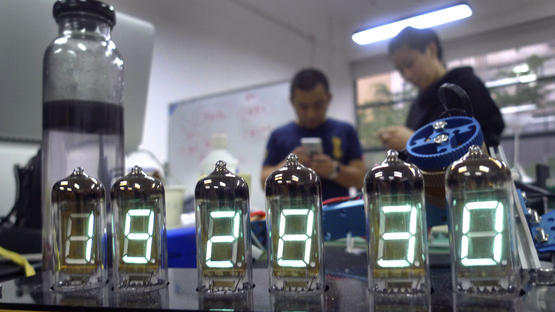 A digital clock is seen at the  Shenzhen Maker Faire in 2016. The city's "maker faire" movement   celebrate arts, crafts, engineering and open-source technology and reflects how the city has evolved from a factory floor to center of innovation.